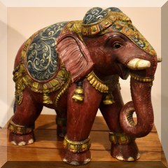 D55. Carved and painted elephant. 18” - $65 
